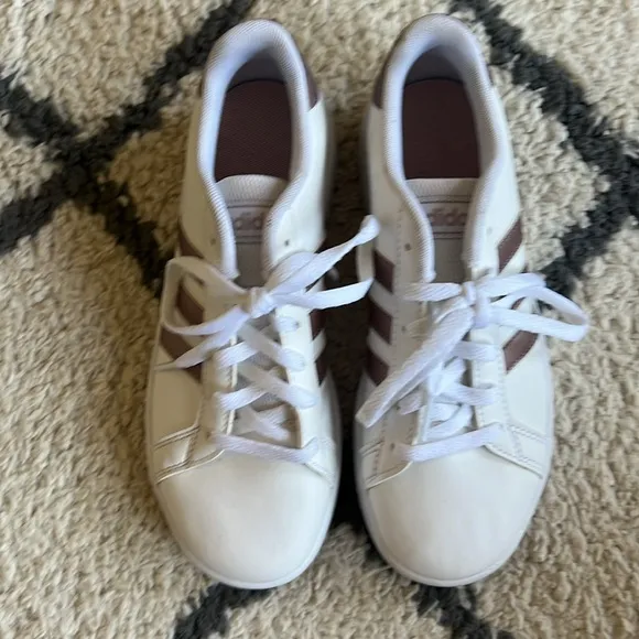 72. Adidas white with rose gold girl’s sneakers