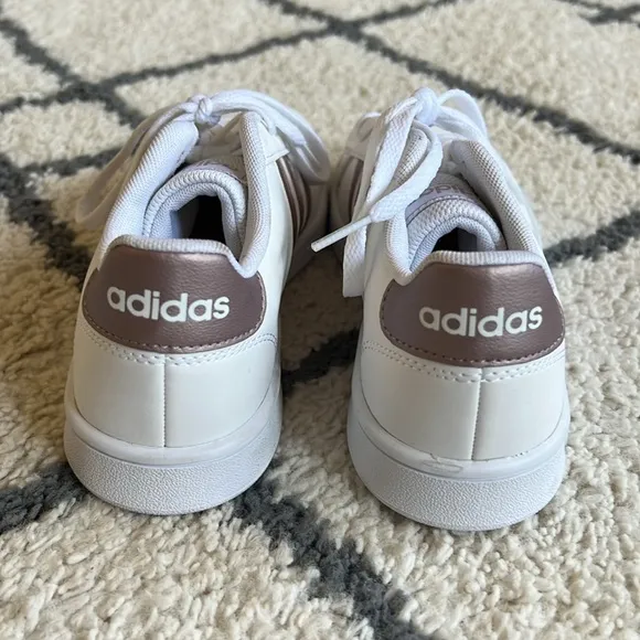 72. Adidas white with rose gold girl’s sneakers