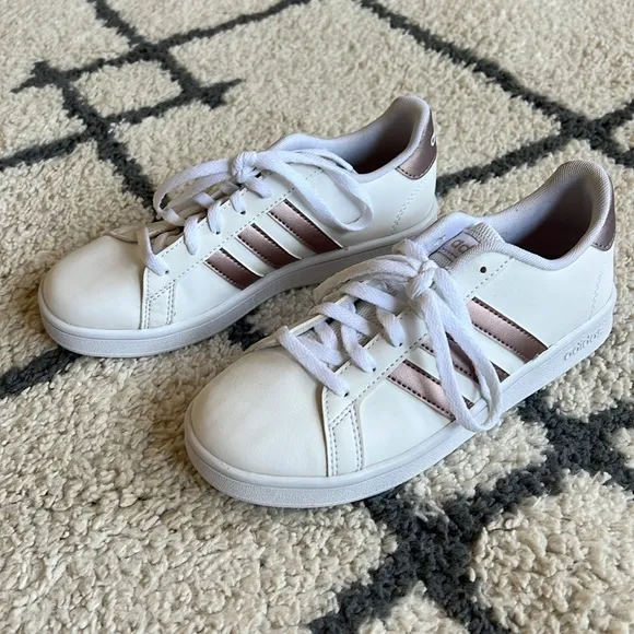72. Adidas white with rose gold girl’s sneakers