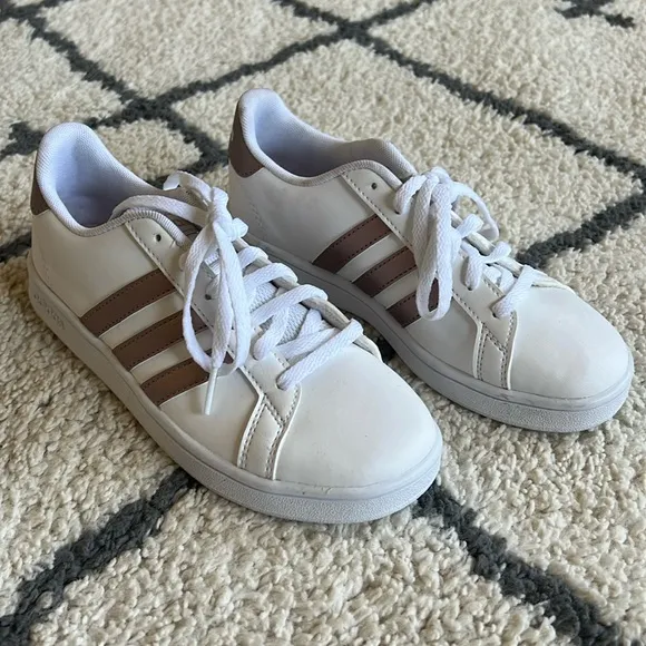 72. Adidas white with rose gold girl’s sneakers